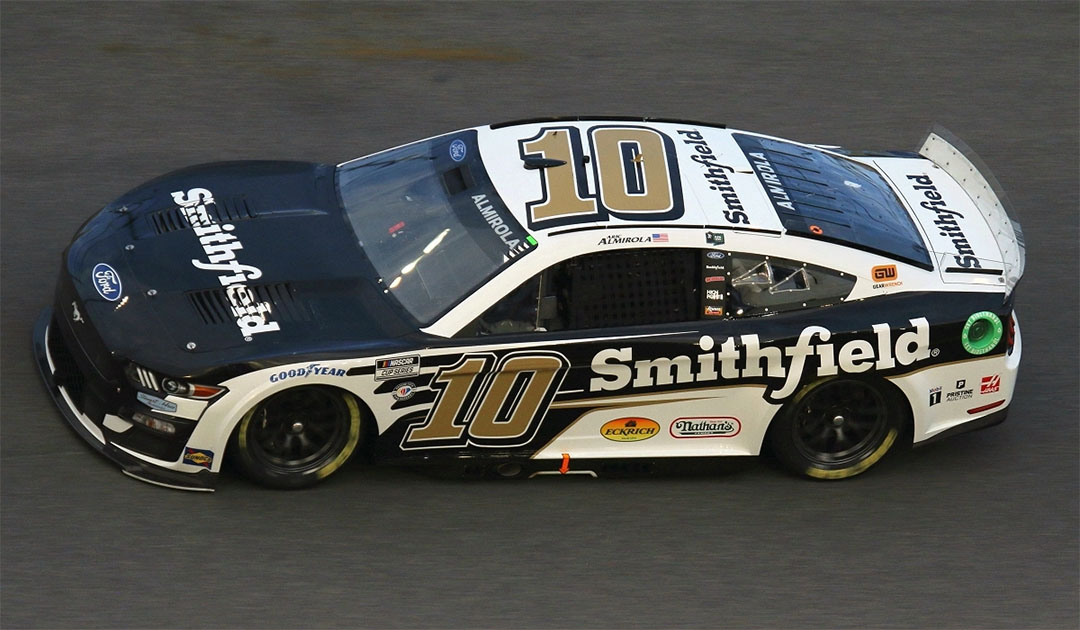 Aric Almirola #10 Smithfield Ford Mustang driving around the track at Daytona 2023